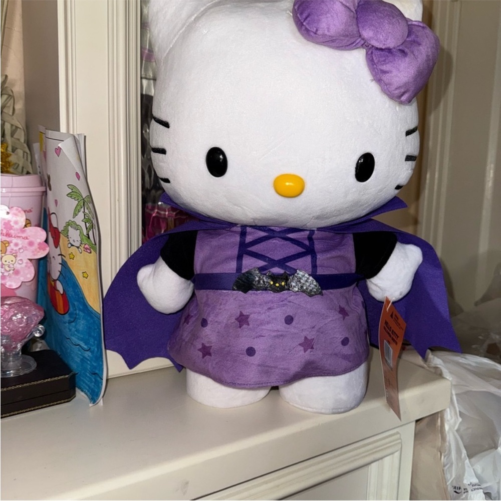 Hello Kitty Plush in Purple Cape and Dress